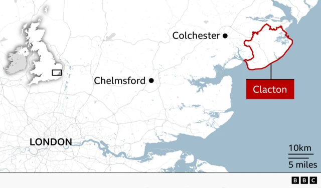 Map of south-east England highlighting the parliamentary constituency of Clacton on the Essex coast with a red outline. The constituency lies to the east of Colchester and north-east of Chelmsford. London is marked to the south-west, and an inset map of the UK shows the constituency's position in eastern England.