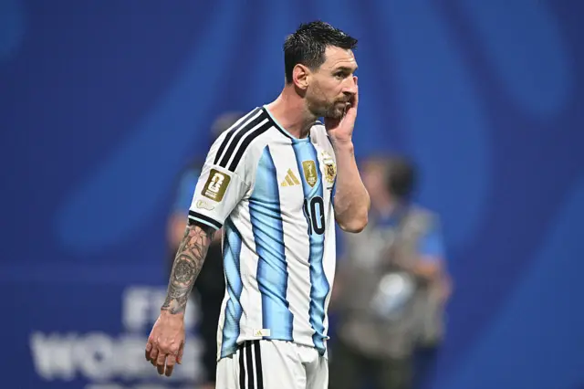 Lionel Messi looks dejected