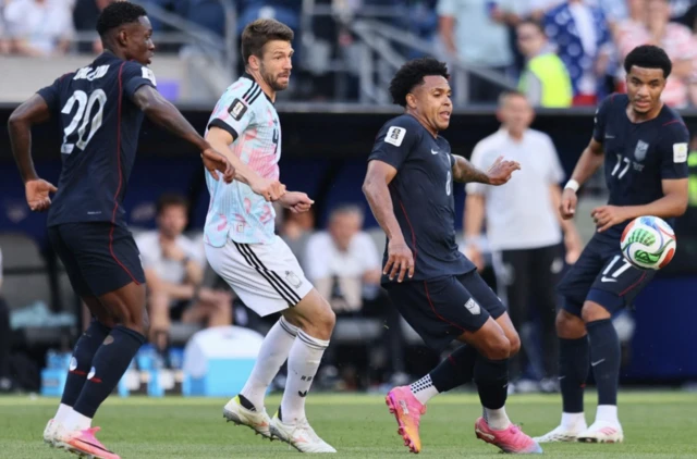 Weston McKennie and Folarin Balogun of the U.S. in action