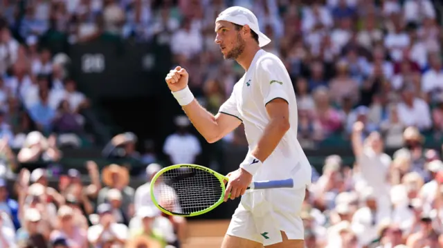 Jan-Lennard Struff of Germany reacts