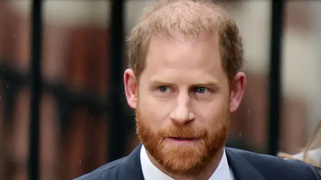 A headshot of Prince Harry