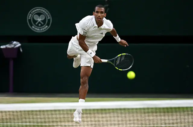 Felix Auger-Aliassime of Canada serves