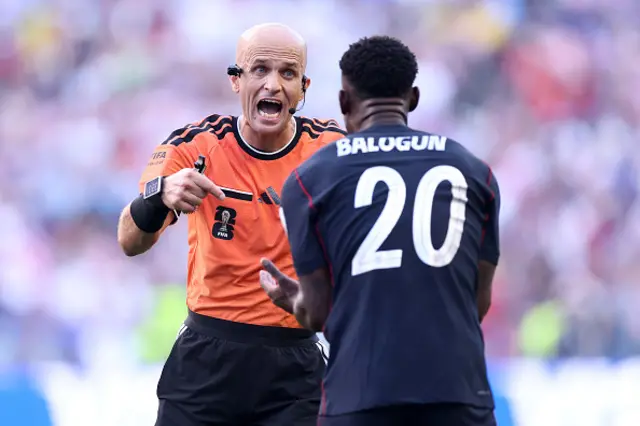 Folarin Balogun #20 of the United States argues with referee Adham Makhadmeh