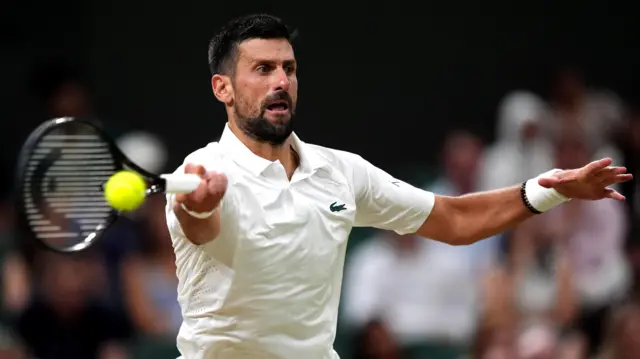 Novak Djokovic hits a forehand