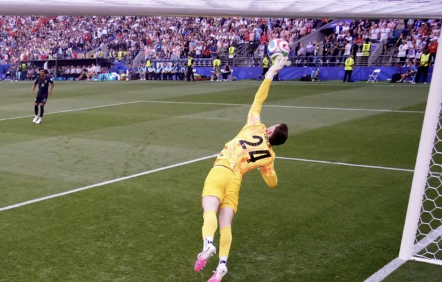Matt Freese of the U.S. saves a shot