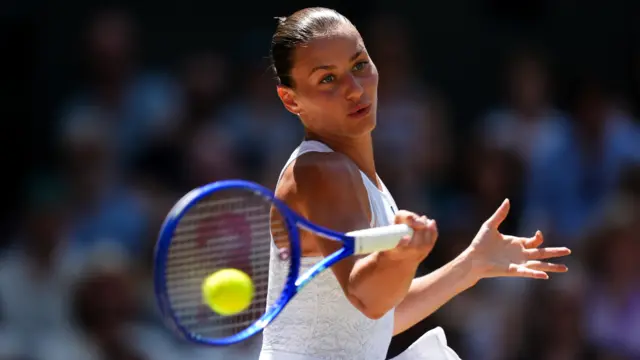Marta Kostyuk hits a forehand