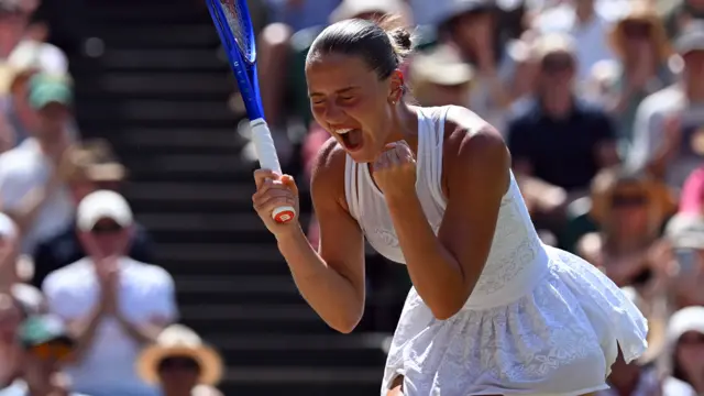 Marta Kostyuk celebrates