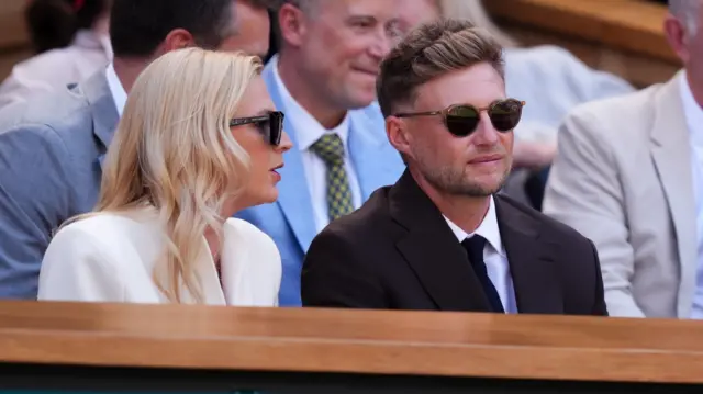 Joe Root sits in the Royal Box