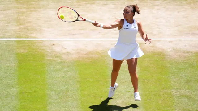 Jasmine Paolini hits a forehand