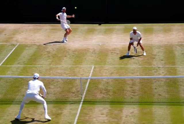 Julian Cash and Lloyd Glasspool in men's doubles action