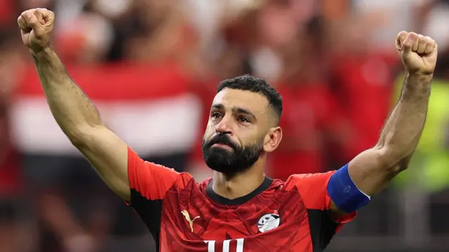 Mohamed Salah #10 of Egypt applauds fans after the team's victory through the penalty shootout during the FIFA World Cup 2026 Round of 32 match between Australia and Egypt at Dallas Stadium on July 03, 2026 in Arlington, Texas