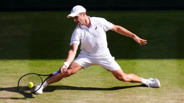 Arthur Fery hits a forehand