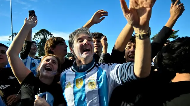 rgentina fans celebrate their team's goals during the Albiceleste's 3-2 victory over Egypt in the FIFA World Cup 2026 Round of 16 match at the Fan Fest in Buenos Aires' Palermo neighborhood on July 7, 2026.
