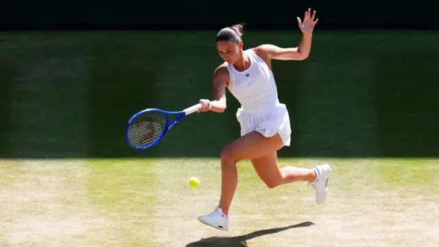 Marta Kostyuk hits a forehand