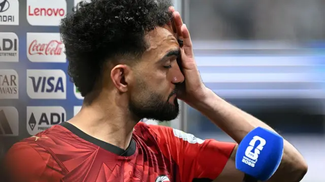 Egypt's midfielder #11 Mostafa Ziko reacts after losing the 2026 World Cup round of 16 football match between Argentina and Egypt at Atlanta Stadium in Atlanta on July 7, 2026.