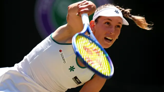 Elise Mertens serves