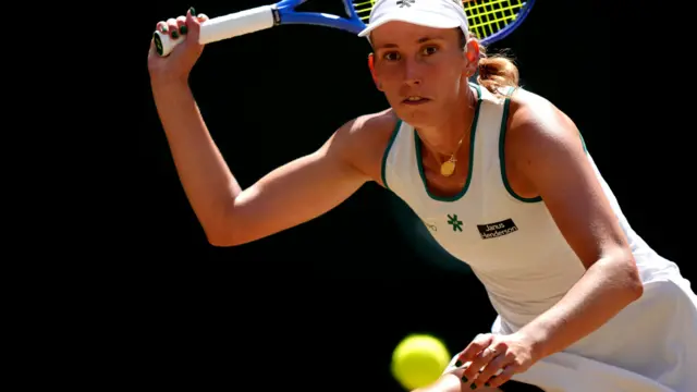 Elise Mertens hits a forehand