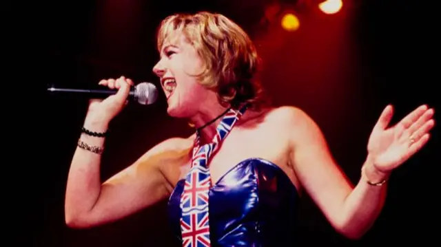 Nicki French performing