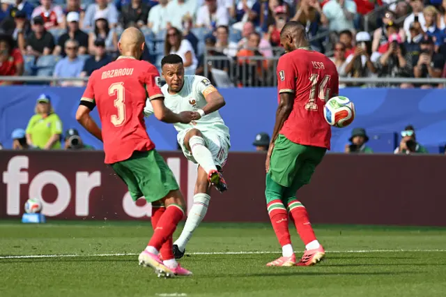 Kylian Mbappe #10 of France scores his team's first goal