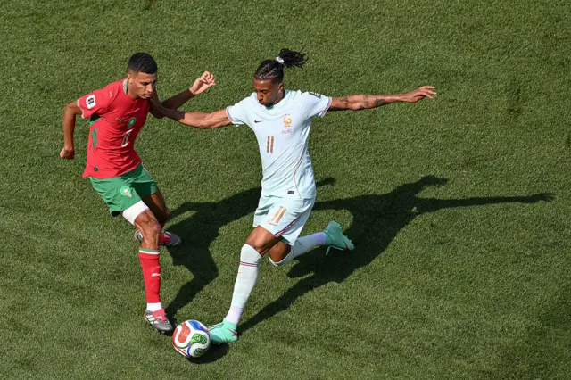 OLise dribbles past his man