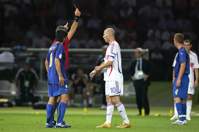 Zinedine Zidane of France receives a red card from referee Horacio Elizondo