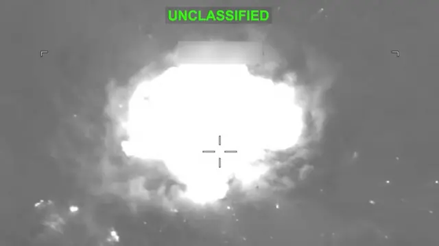 Fire and smoke rise from explosions at an unknown location, following what US Central Command said were strikes on Iranian military targets, in this screen grab from a video released on July 8, 2026.