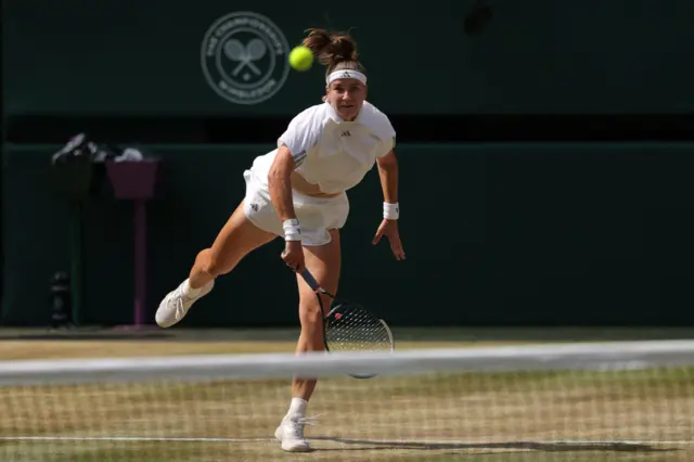 Karolina Muchova serves