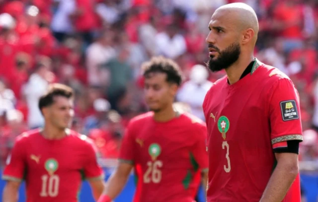 Morocco's Noussair Mazraoui reacts as he walks off the pitch