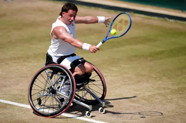 Alfie Hewett hits a backhand