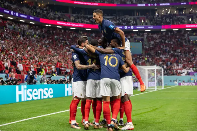 France players celebrate scoring against Morocco