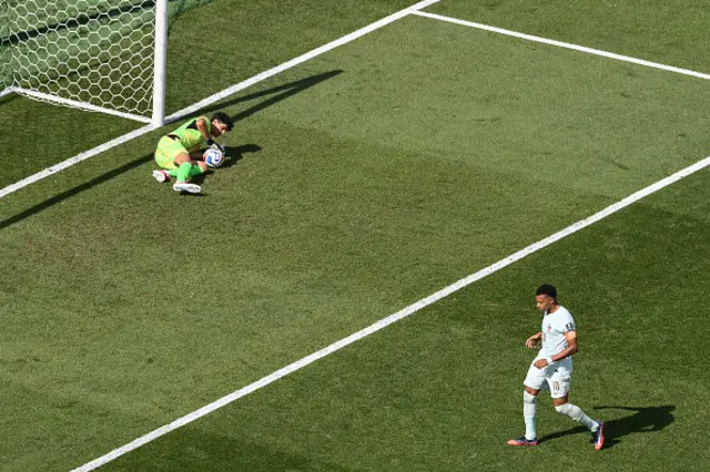 Yassine Bounou saves a penalty kick