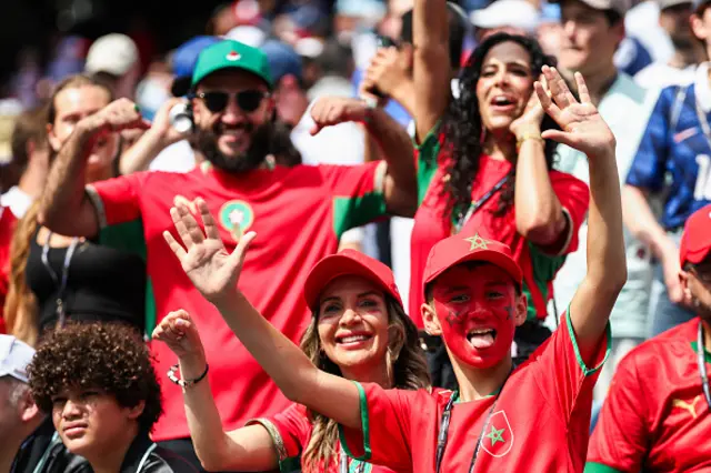 Moroccan fans cheer for their team
