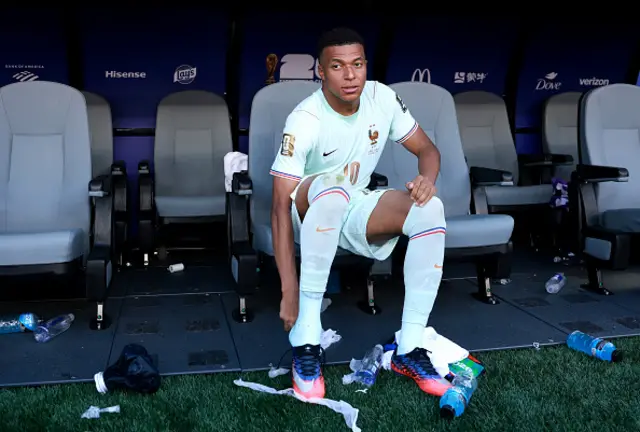 Kylian Mbappe #10 of France looks on from the bench
