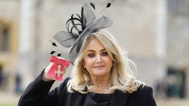 Bonnie Tyler with her MBE