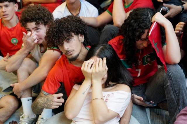 Morocco fans react after France's Kylian Mbappe scored