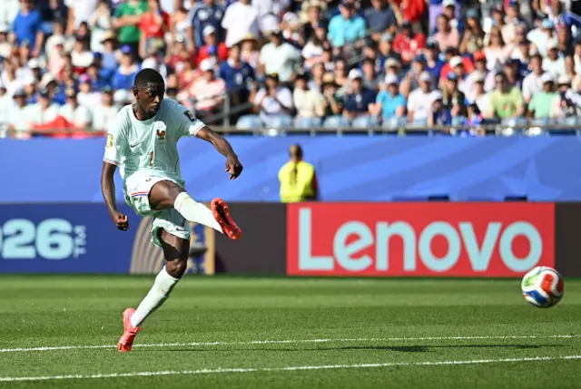 Ousmane Dembele #7 of France scores his team's second