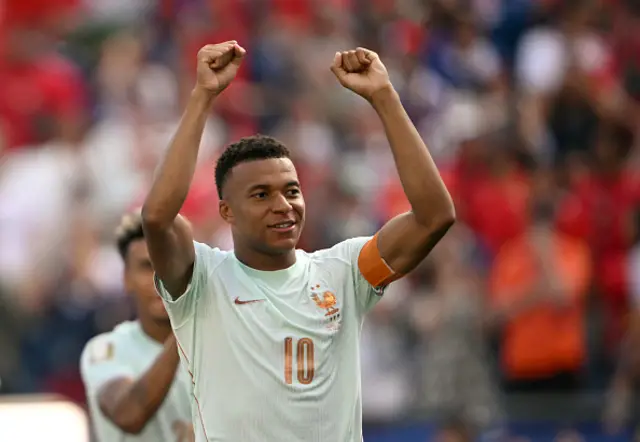 Kylian Mbappe celebrates