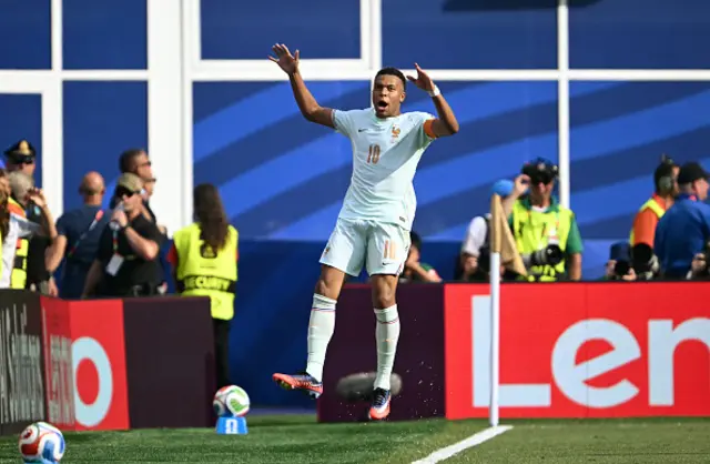 Kylian Mbappe celebrates