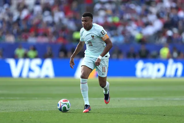 Kylian Mbappe #10 of France controls the ball
