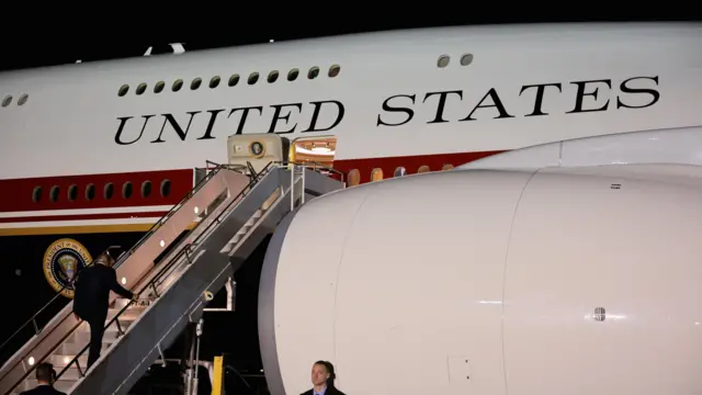 Donald Trump boards the new, Qatari-gifted Air Force One after arriving on one of the older planes operating as Air Force One, to return to Washington after his participation in a NATO leaders summit in Turkey.