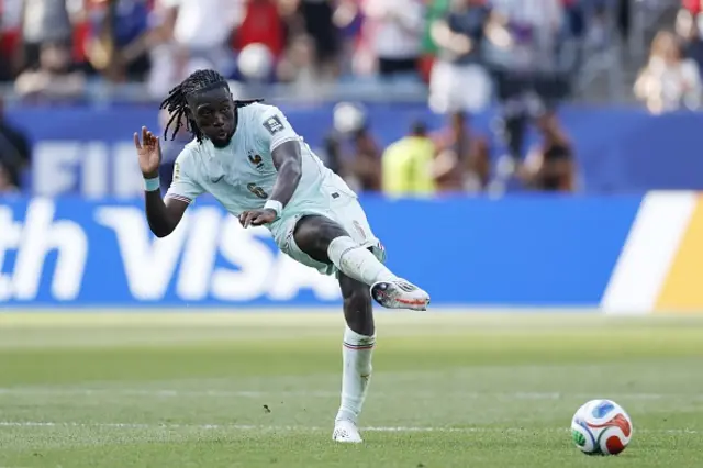 Manu Kone of France passes the ball