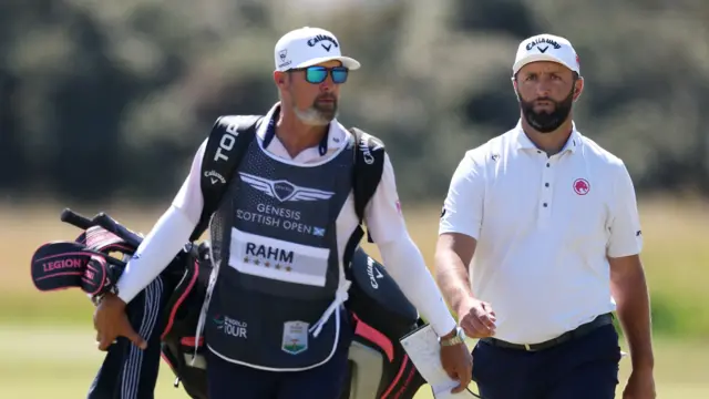 Jon Rahm on the course