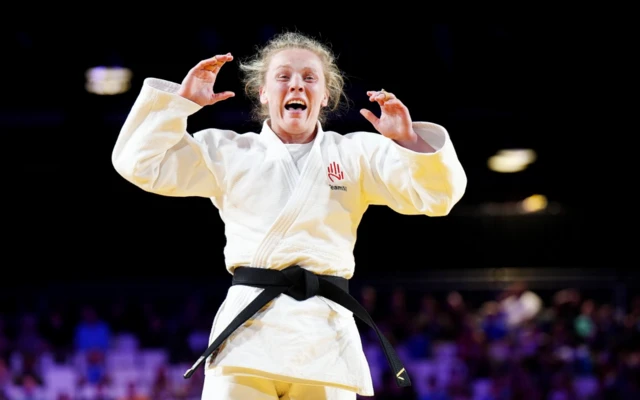 Rachel Hawkes celebrates winning a bronze medal at the Commonwealth Games