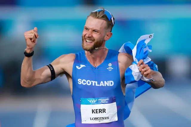 Josh Kerr celebrates