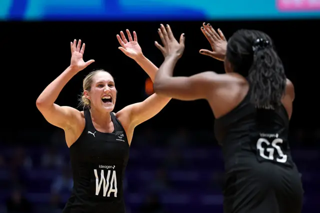 Maddy Gordon of Team New Zealand and Grace Nweke of Team New Zealand celebrate