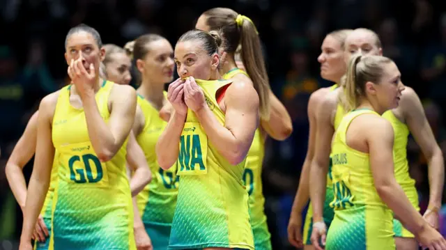 Disappointed Australia players after losing to Jamaica