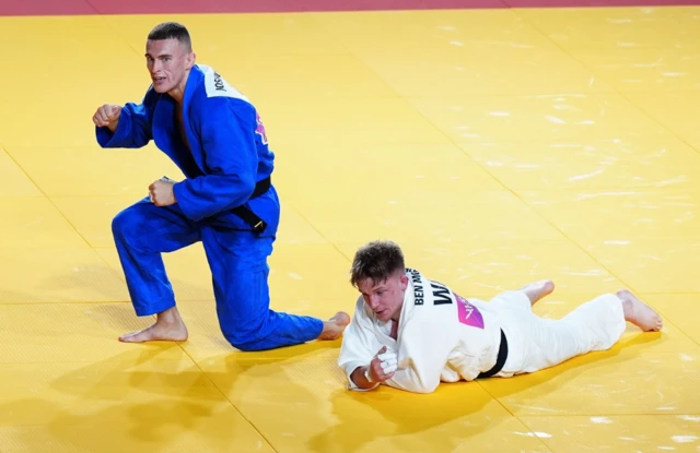 Joshua Green of Northern Ireland celebrates winning his Men's Judo -73 kg contest for bronze medal against Ben Moore of Wales