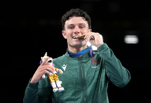 Gold medalist Jon McConnell of Team Northern Ireland poses for a photo during the Men's 70kg medal ceremony
