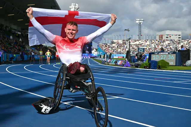 England's Nathan Maguire celebrates winning Commonwealth Games gold in men's 1500m T54
