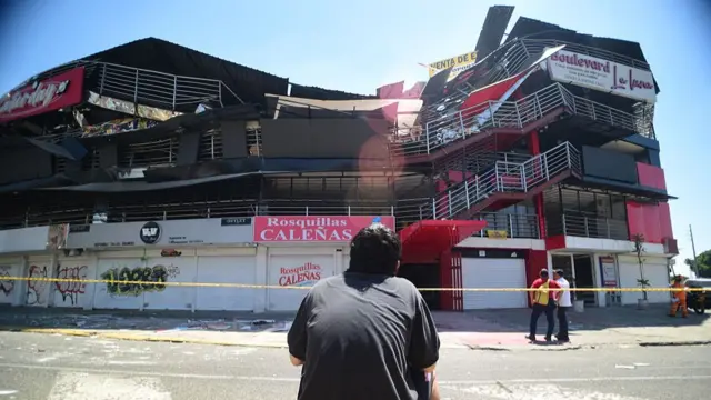 Residents inspect damaged buildings after a magnitude 7.4 earthquake struck Colombia, killing at least 111 people and injuring 87 others, in Cali, Colombia, on August 10, 2026